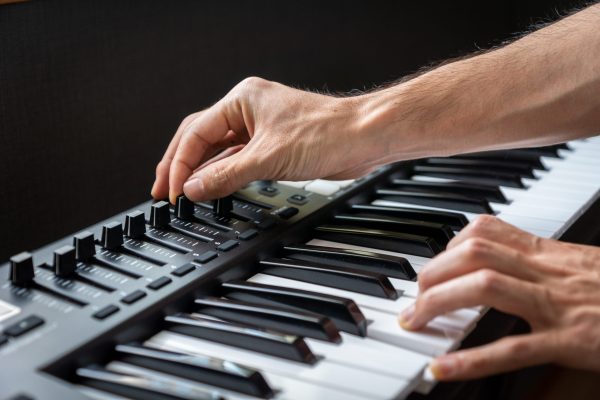 MIDI keyboard synthesizer piano keys closeup for electronic music production / recording